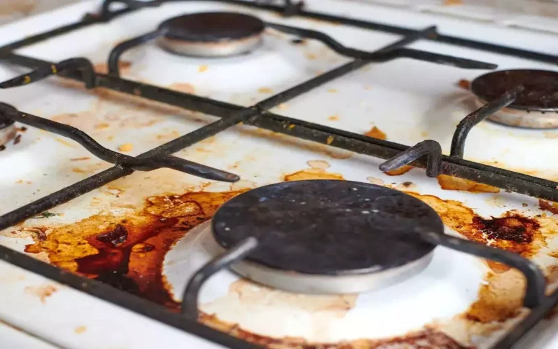 unclean oven cooktop